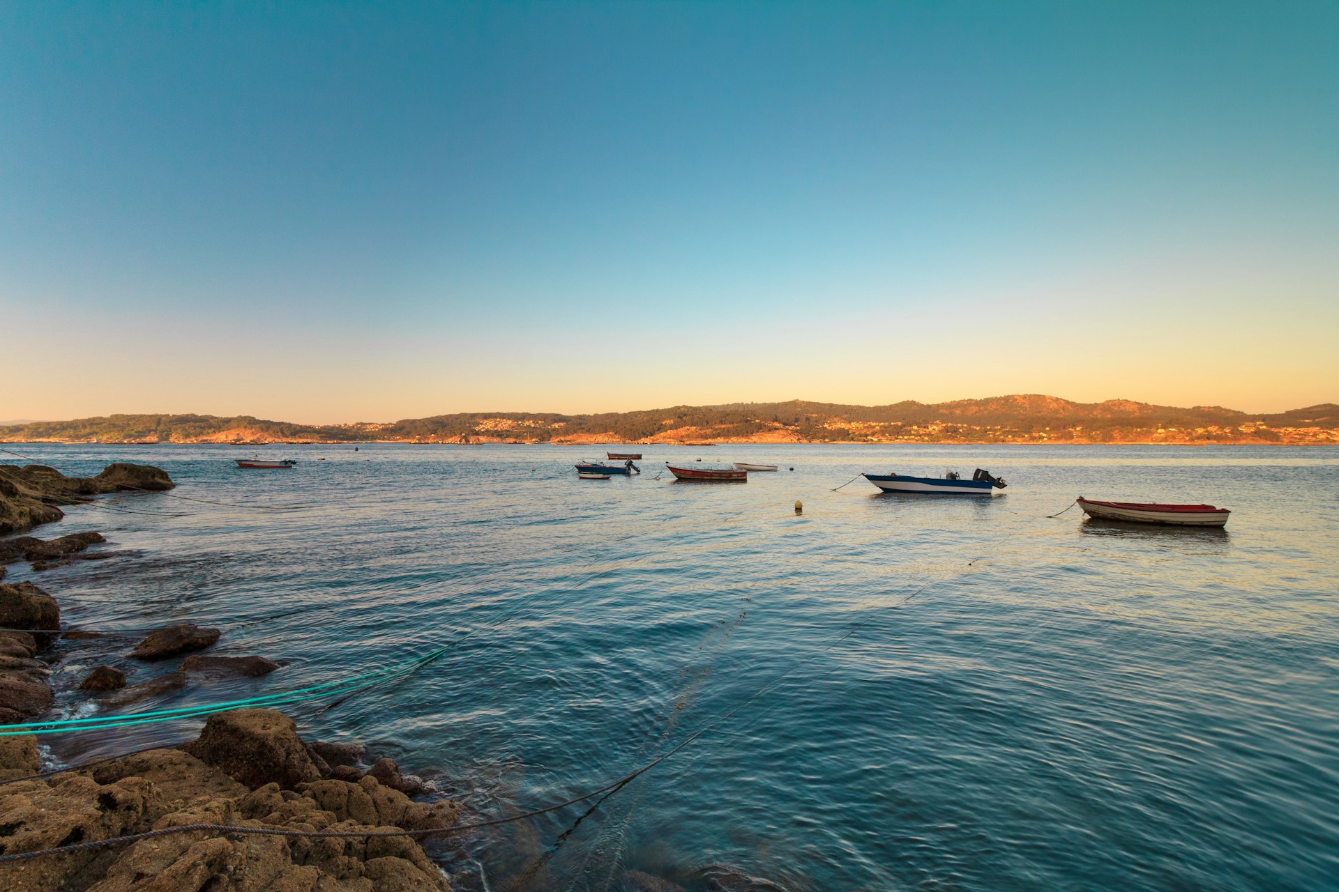white boat on sea during daytime