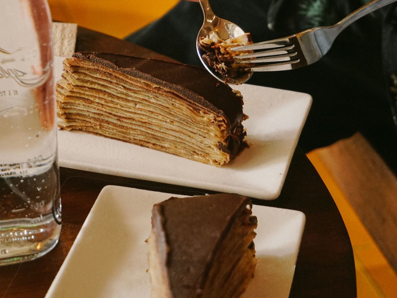 person holding stainless steel fork