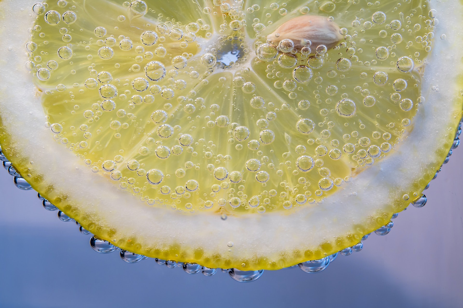yellow lemon with water droplets