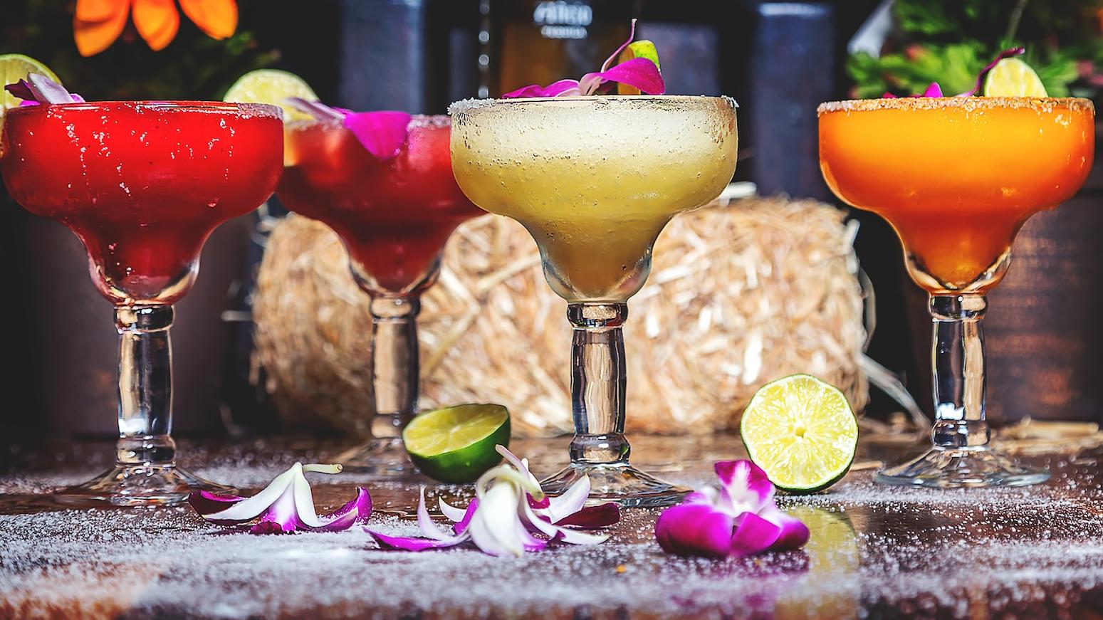 full footed glasses near flowers