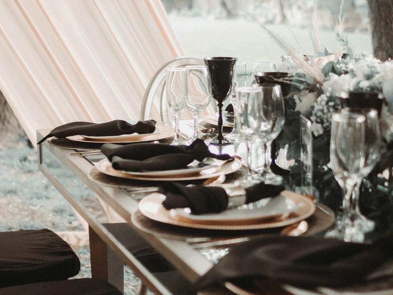 a table with plates and glasses on it