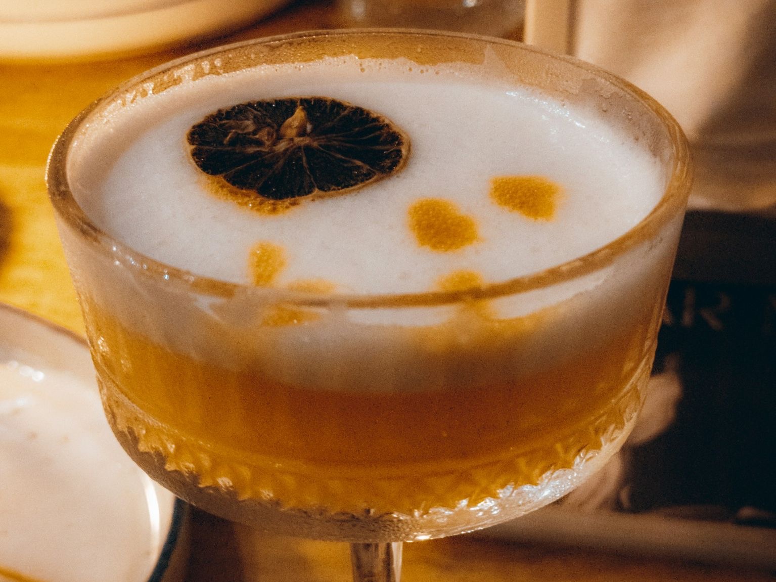 a close up of a drink on a table